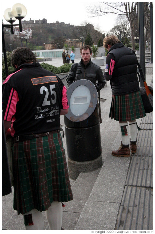 Rugby fans wearing kilts.  Princes Street.