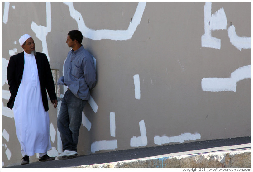 Two men talking. Hout street, Bo-Kaap.