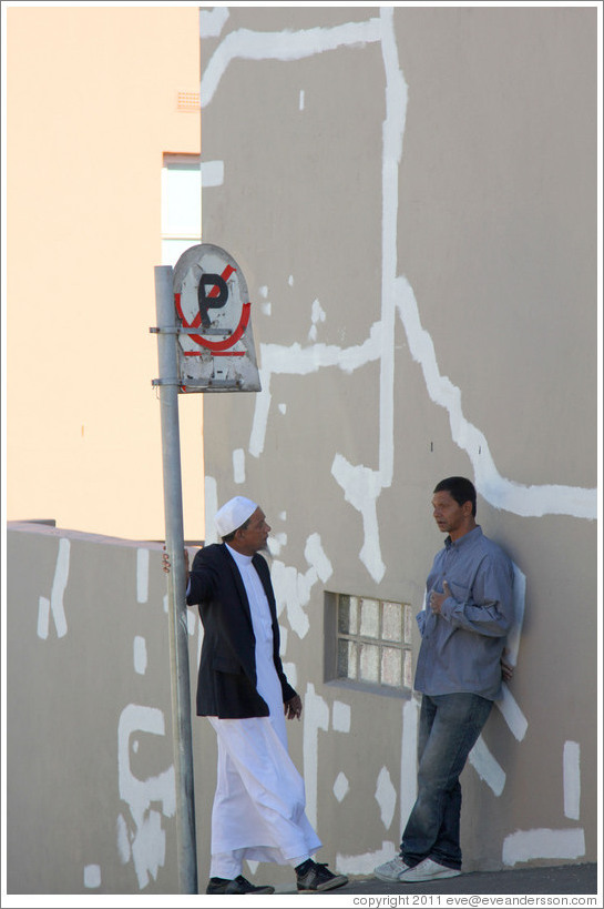 Two men talking. Hout street, Bo-Kaap.