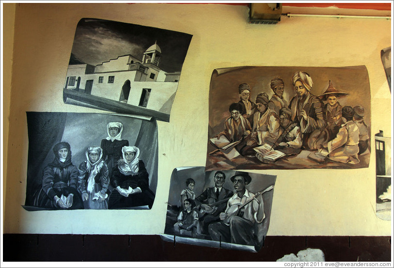 Paintings showing families and professions of early Bo-Kaap residents. Corner of Wale Street and Chiappini Street.