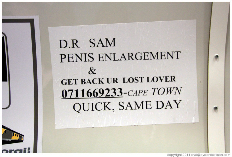 Sign in the commuter train advertising same-day penis enlargement by D.r Sam.