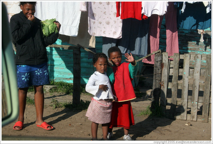 Kids waving.  Langa township.
