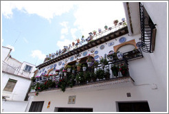 House decorated with plates.  Calle del Horno de San Agust?(Street of Saint Augustine's Oven).  Albaic?