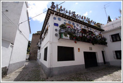 House decorated with plates.  Calle del Horno de San Agust?(Street of Saint Augustine's Oven).  Albaic?