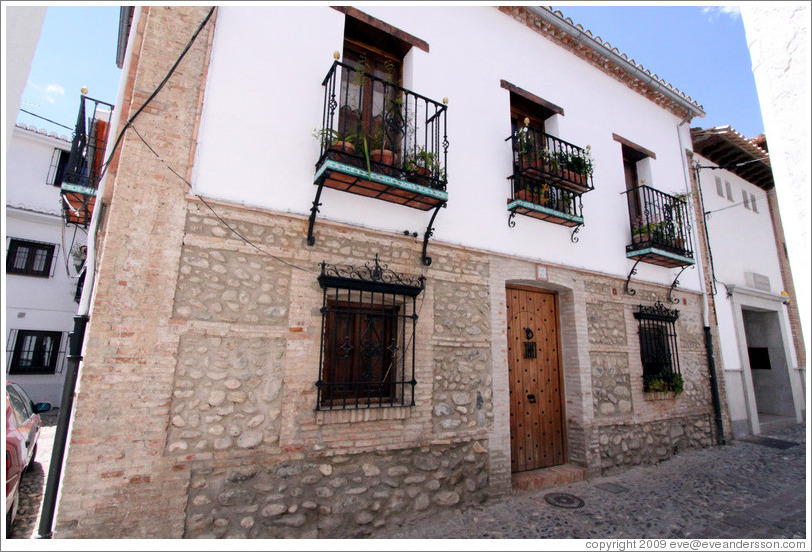 House with three balconies.  Calle del Horno de San Agust?(Street of Saint Augustine's Oven).  Albaic?