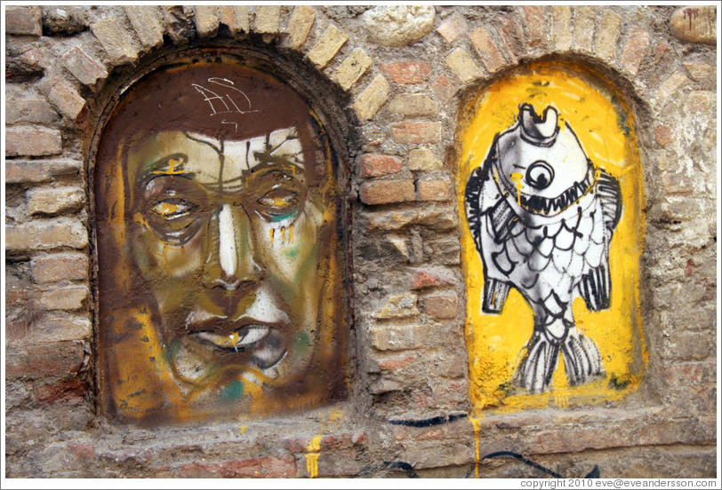 Graffiti depicting a man and a fish. Cuesta Aceituneros, Albaic?