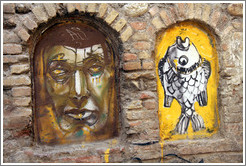 Graffiti depicting a man and a fish. Cuesta Aceituneros, Albaic?