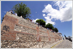 People sitting on the wall.  Mirador de San Nicol?  Albaic?