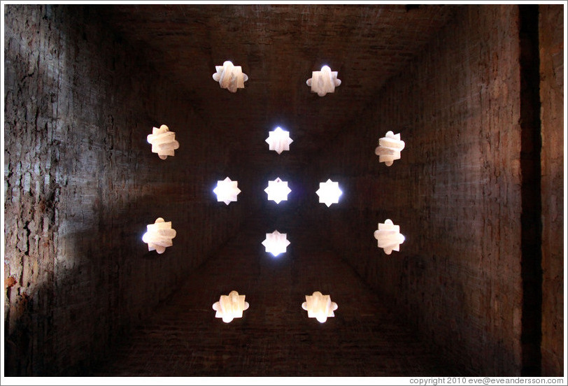 Star-shaped openings in the ceiling, mosque baths, Alhambra.