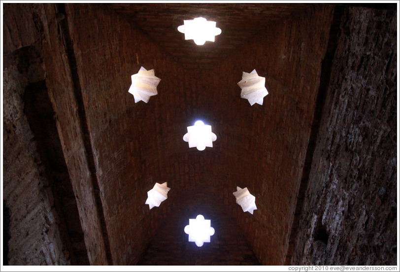 Star-shaped openings in the ceiling, mosque baths, Alhambra.