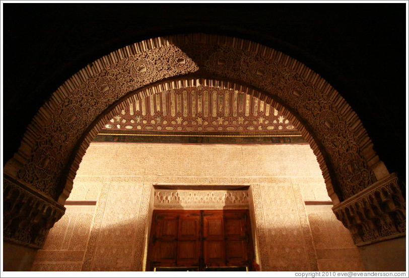 Arch leading to the Mexuar, Nasrid Palace, Alhambra at night.