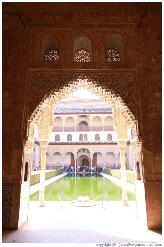 Patio de los Arrayanes seen through an arch in the Sala de la Barca, Nasrid Palace, Alhambra.