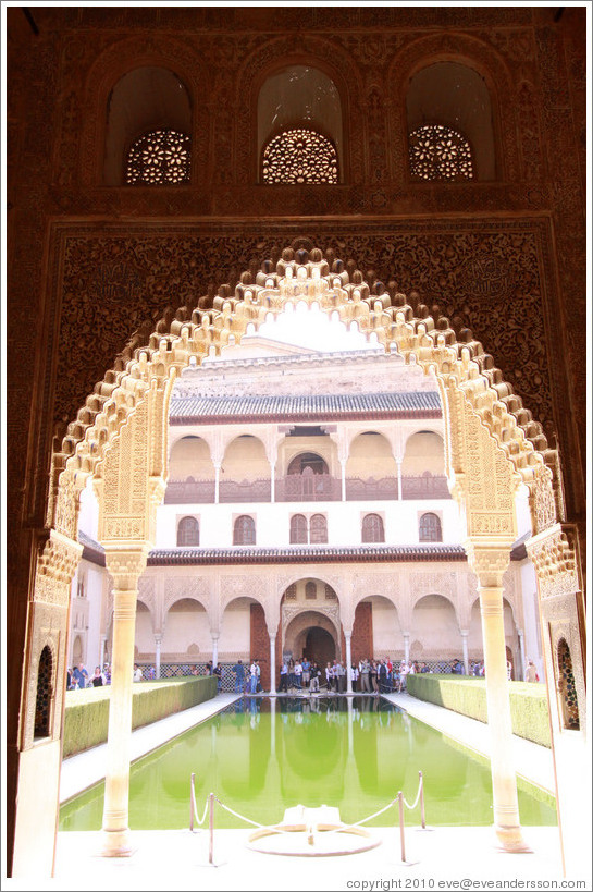 Patio de los Arrayanes seen through an arch in the Sala de la Barca, Nasrid Palace, Alhambra.