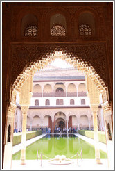 Patio de los Arrayanes seen through an arch in the Sala de la Barca, Nasrid Palace, Alhambra.