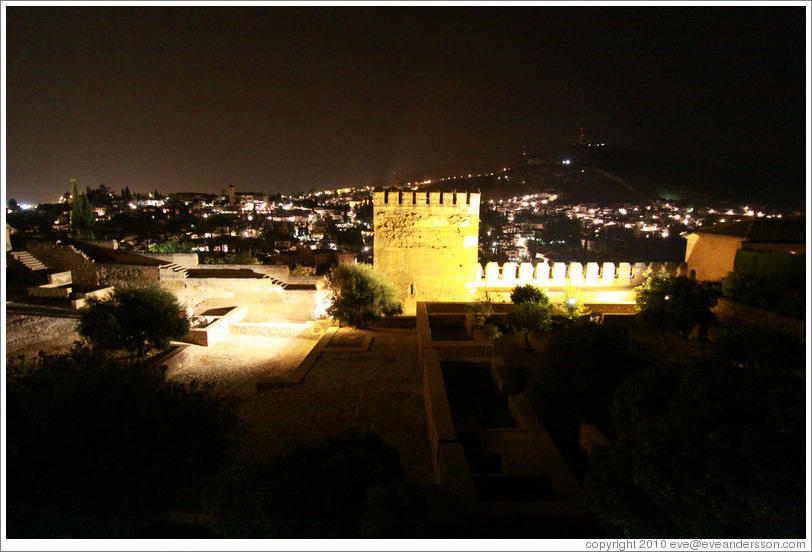 Patio de Muchaca, Alhambra, and with a view of the city of Granada at night.