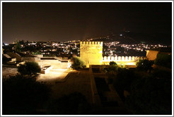 Patio de Muchaca, Alhambra, and with a view of the city of Granada at night.