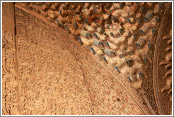 Wall with stucco pattern and portion of the ceiling with muqarnas, Sala de la Barca, Nasrid Palace, Alhambra at night.