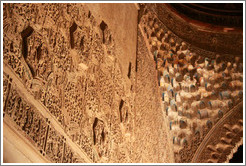 Wall with stucco pattern and portion of the ceiling with muqarnas, Sala de la Barca, Nasrid Palace, Alhambra at night.
