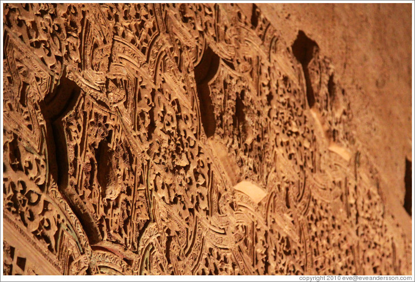 Wall with stucco pattern, Sala de la Barca, Nasrid Palace, Alhambra at night.