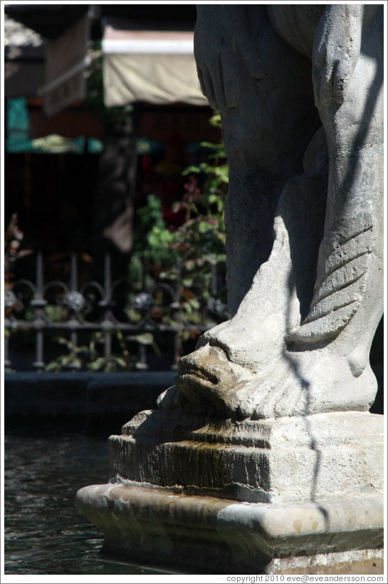 Detail from the 17th century Fuente de los Gigantes (Fountain of the Giants), perhaps a fish between a giant's feet. Plaza de Bib-Rambla, city center.