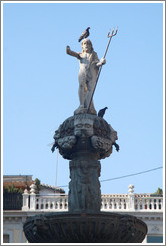 Neptune with a pigeon on his head. Fuente de los Gigantes (Fountain of the Giants). Plaza de Bib-Rambla, city center.