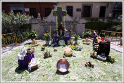 Cross for Fiesta de las Cruces near the Iglesia de San Gil y Santa Ana.  City center.