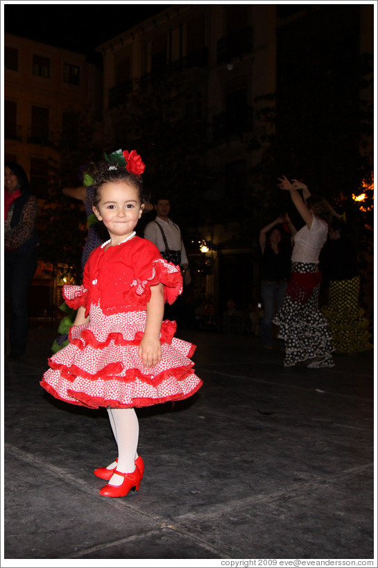 Girl in red.  Fiesta de las Cruces.  Plaza del Carmen.  City center.