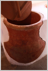 Terra cotta container used for storing olive oil, in a 15th century Moorish olive oil mill, used by the town of Nig?elas until 1920.