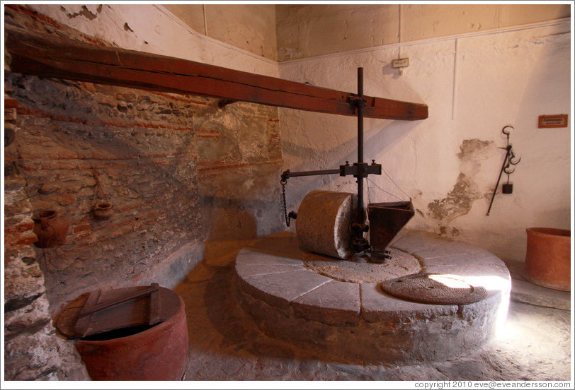 Olive crusher powered by water. 15th century Moorish olive oil mill, used by the town of Nig?elas until 1920. 
