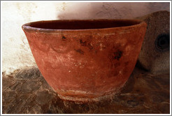 Terra cotta container from the 13th century. In a 15th century Moorish olive oil mill, used by the town of Nig?elas until 1920.