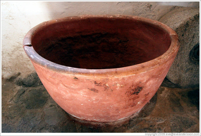 Terra cotta container from the 13th century.  In a 15th century Moorish olive oil mill, used by the town of Nig?elas until 1920.