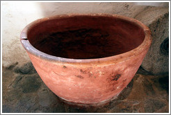 Terra cotta container from the 13th century.  In a 15th century Moorish olive oil mill, used by the town of Nig?elas until 1920.