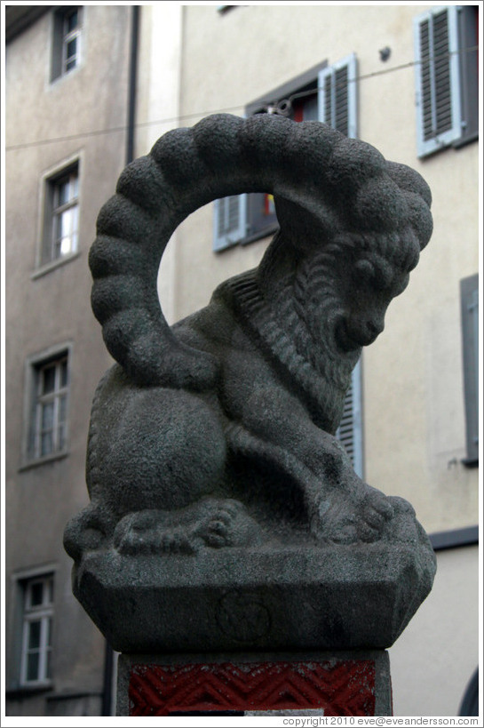 Figure, maybe a goat, on a fountain.  Majoranplatz, Old Town, Chur.