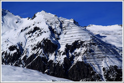 Mountains with avalanche control barriers, above Davos.