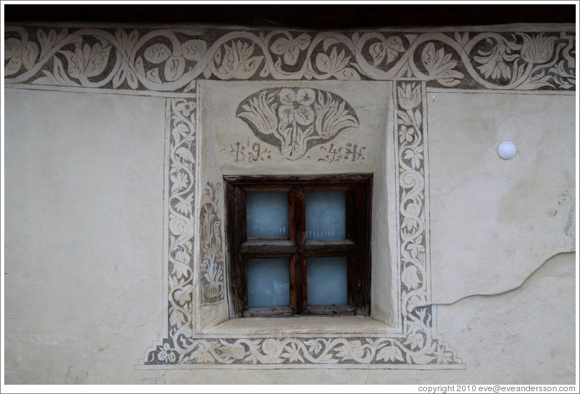 Window, with Romansh designs.