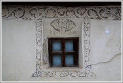 Window, with Romansh designs.