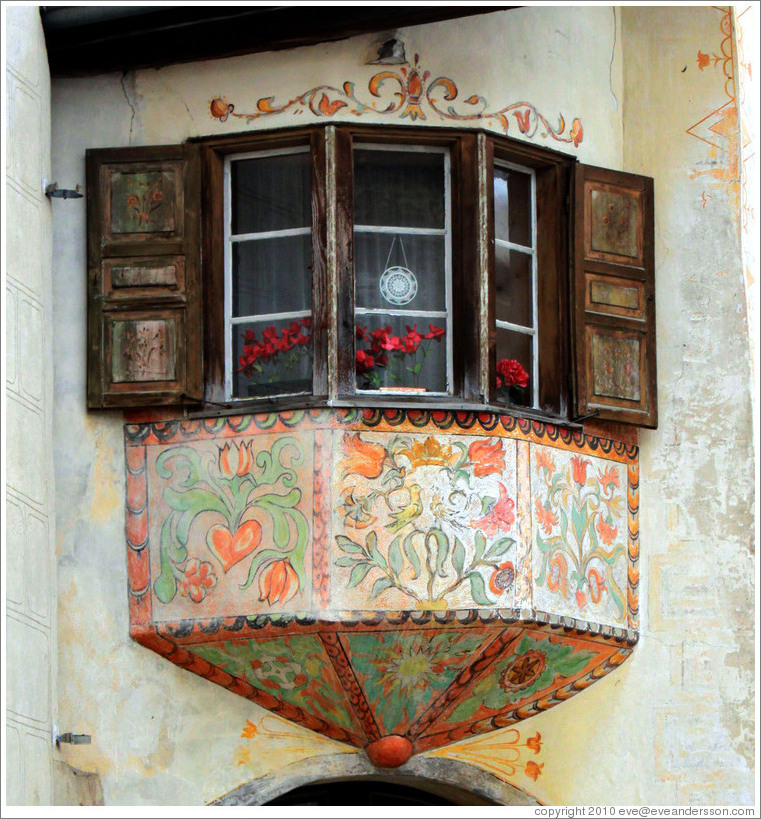 Window, with Romansh designs.