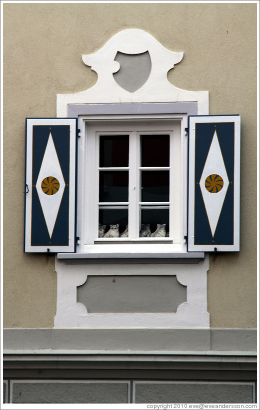 Window.  Shutters show a typical Romansh pattern.