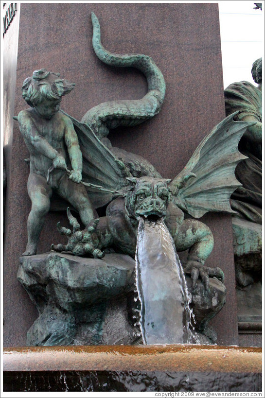 Dragon-dog figure on fountain outside Z?rich Hauptbahnhof (Main Station). Altstadt (Old Town).