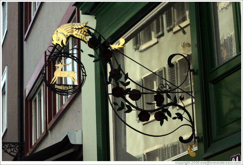 Shop sign with reindeer.  Altstadt (Old Town).