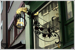 Shop sign with reindeer.  Altstadt (Old Town).