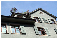 Feet in a window on a sunny day.  Altstadt (Old Town).