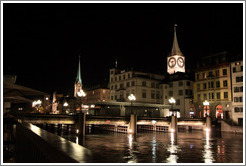 Altstadt (Old Town) at night.  Rathausbr?cke (Town Hall Bridge) and the towers of Kirche St. Peter (St. Peter's Church) and Fraum?nster (Minster of Our Lady church) are visible.