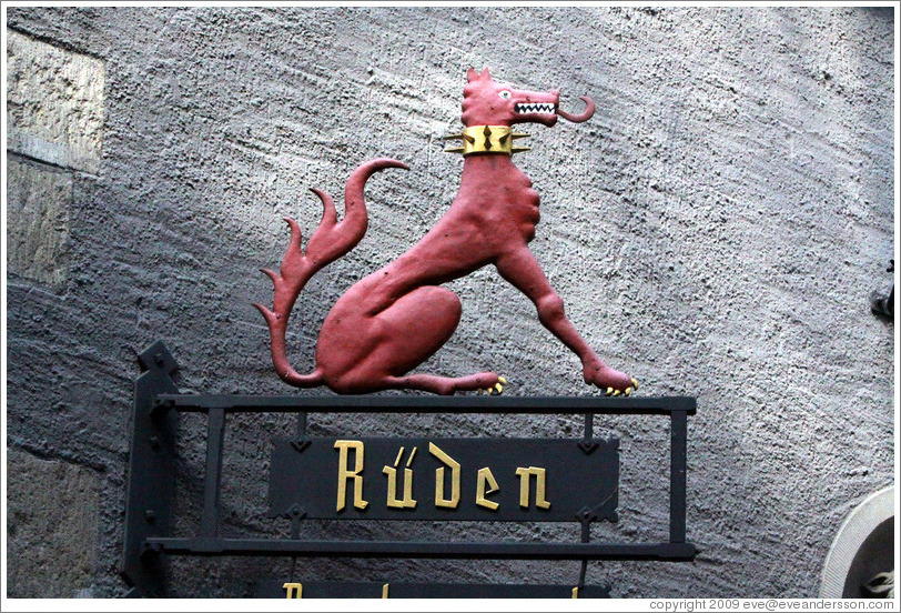 Dragon-dog with spiky collar. R?den Restaurant. Altstadt (Old Town).