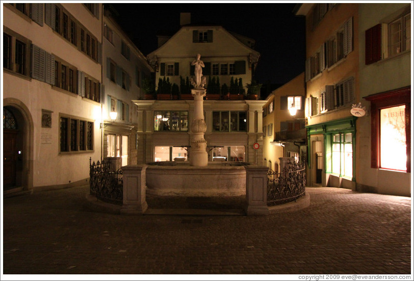 Fountain on Spiegelgasse at night.  Altstadt (Old Town).