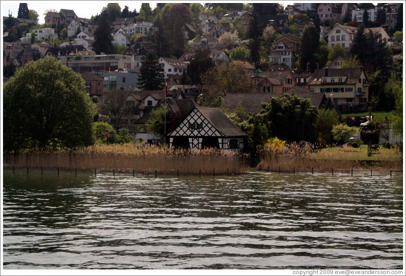 House in long grass on Z?richsee (Lake Z?rich).
