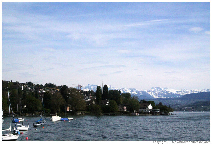 Layers of clouds and the shore of Z?richsee (Lake Z?rich) at K?snacht.