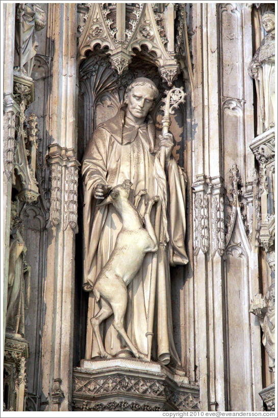 Statue of a man and a hoofed animal, possibly a deer (19th-century), High Altar Winchester Cathedral.