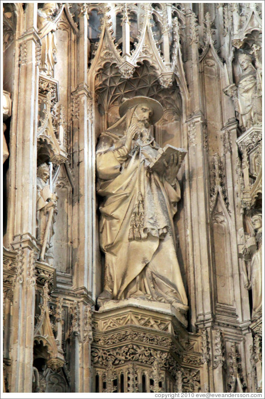 Statue of a man wearing a hat (19th-century), High Altar, Winchester Cathedral.