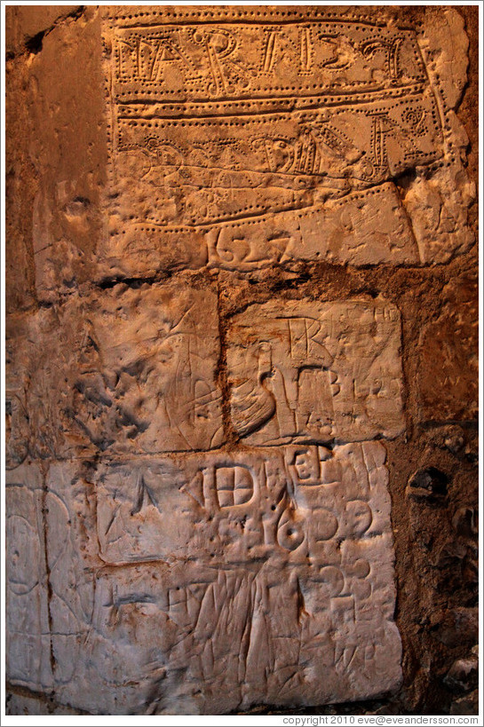 Graffiti made by prisoners. 1602 and 1627, presumably years, are inscribed in the wall.  Westgate.
